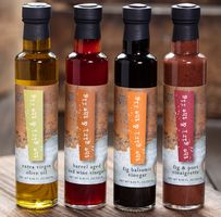 the girl & the fig olive oil, vinegars and vinaigrette food label design